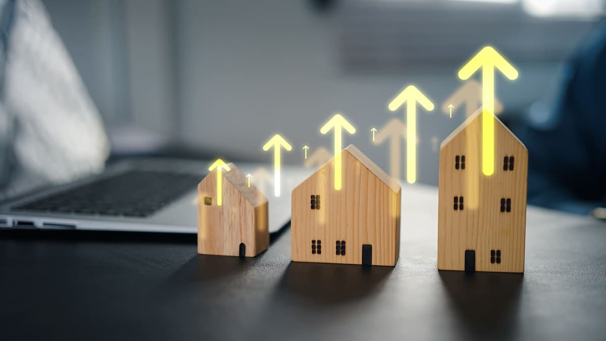 apartamentos de blocos com setas pra cima mostrando a valorização